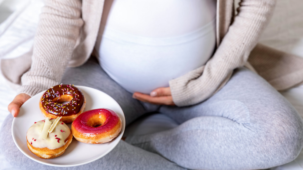 pregnant belly and donuts