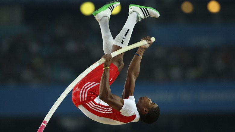 lazaro borges pole vaulting in mid air