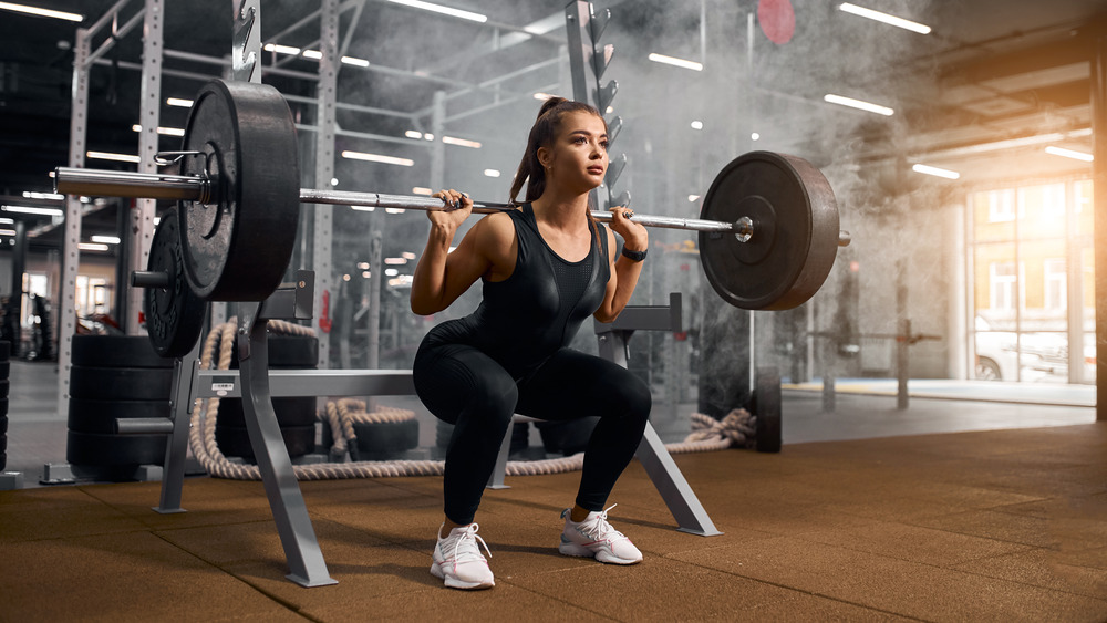 woman with personal trainer