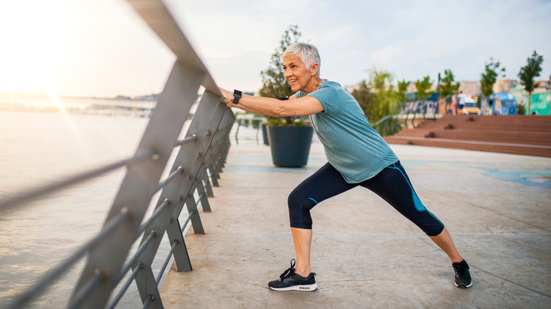 senior woman exercising outside