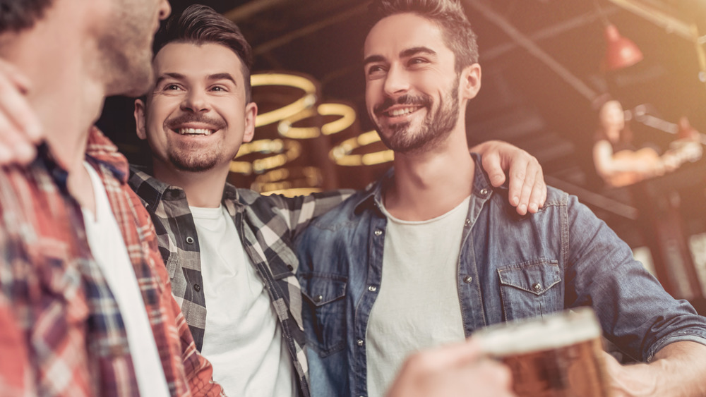 Men at a bar during COVID-19