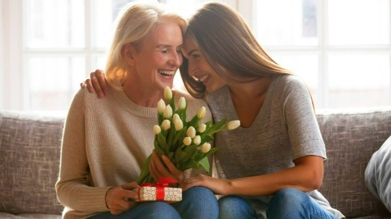 two women laughing together