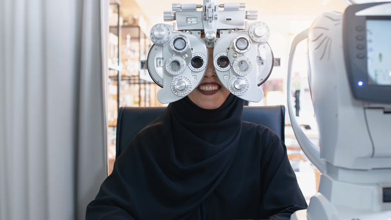 woman getting eye exam