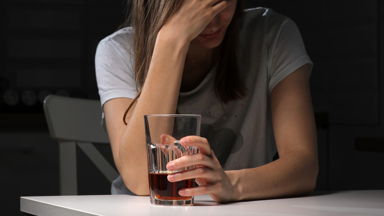 woman drinking alcohol