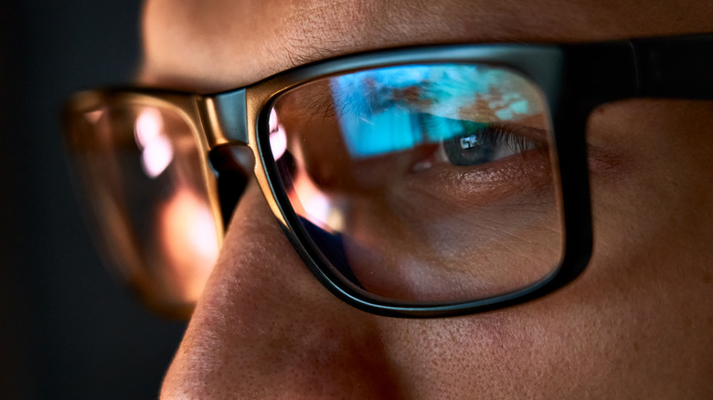 Close up of a man wearing glasses 