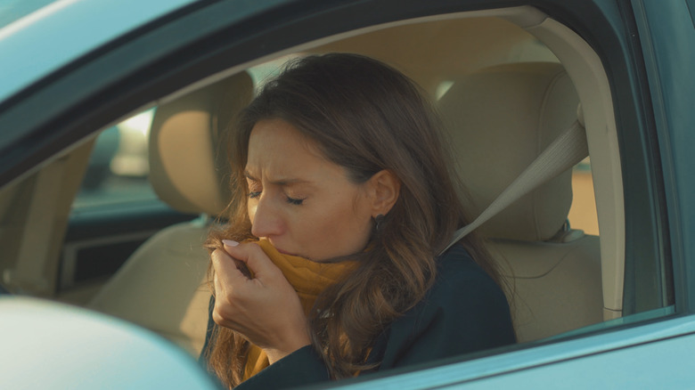 traffic jam woman coughing