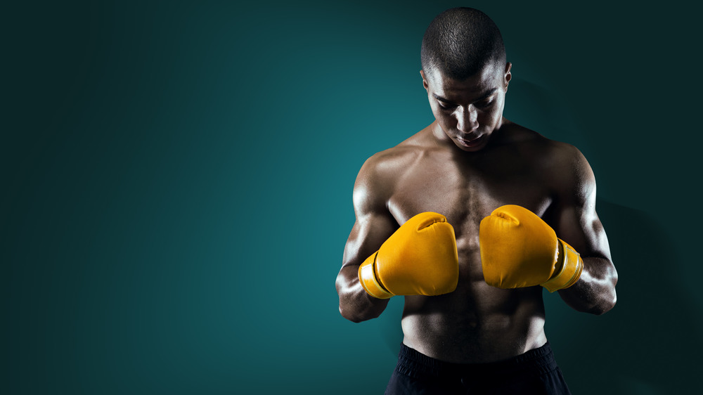 male athlete with boxing gloves