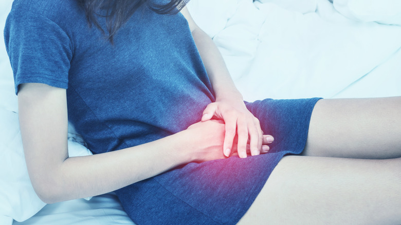 woman with pelvic area pain from UTI