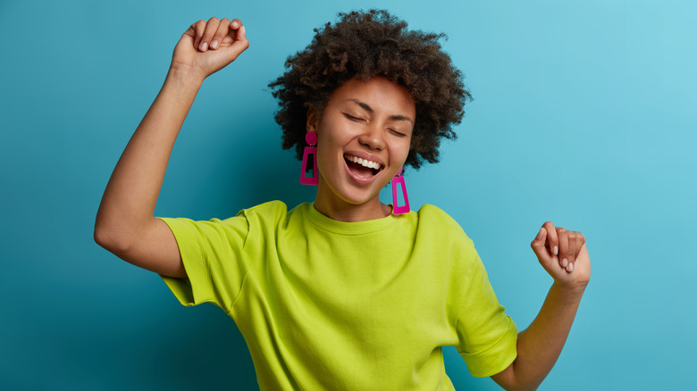 Woman looking happy and energetic