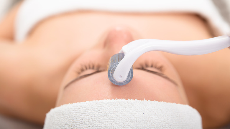 closeup of a woman receiving a microneedling treatment