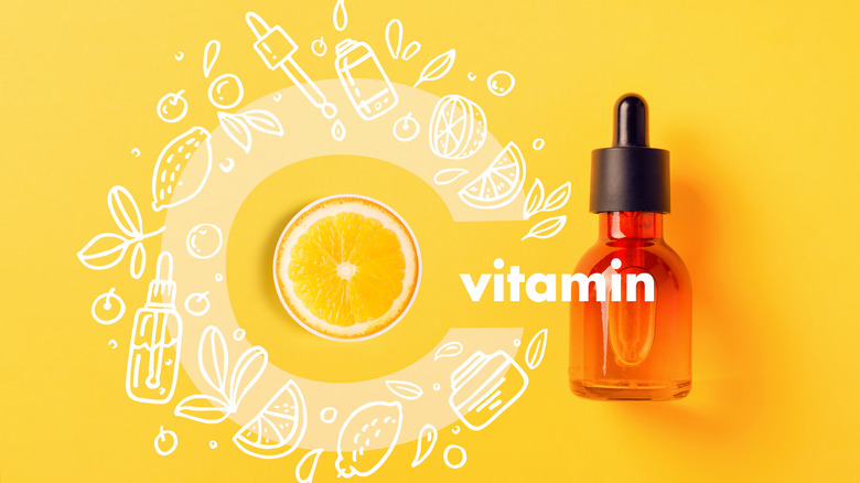 the words vitamin c with a fruit slice and a bottle of liquid