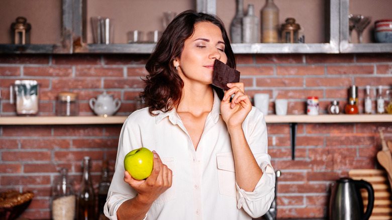 woman smelling chocolate