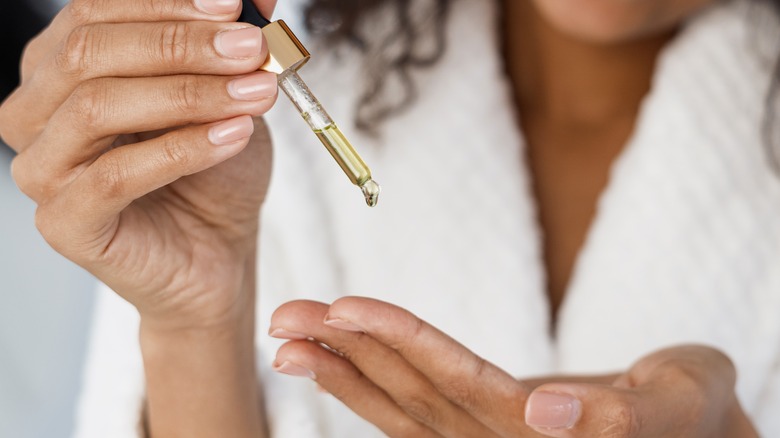 woman caring for nails