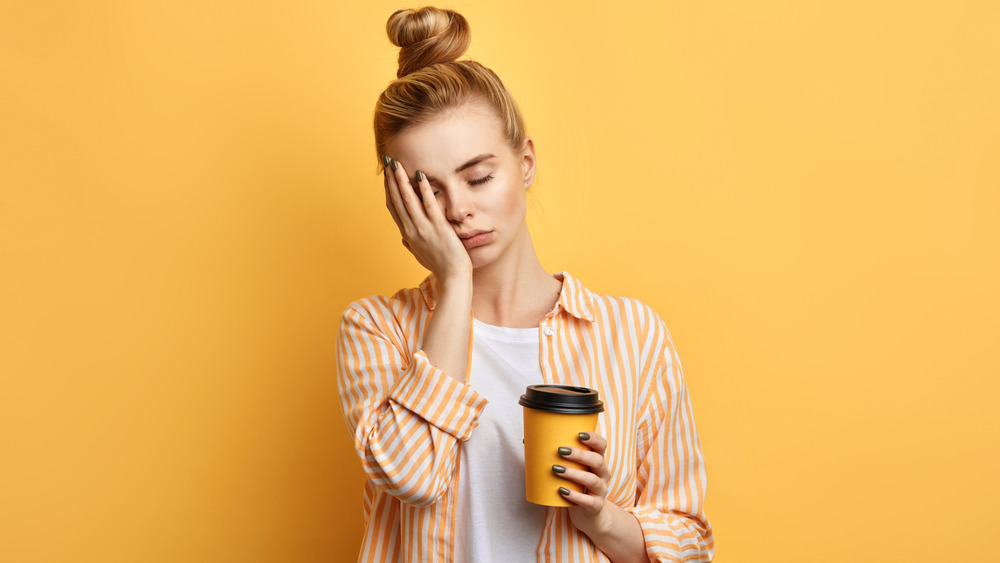 tired woman needs coffee