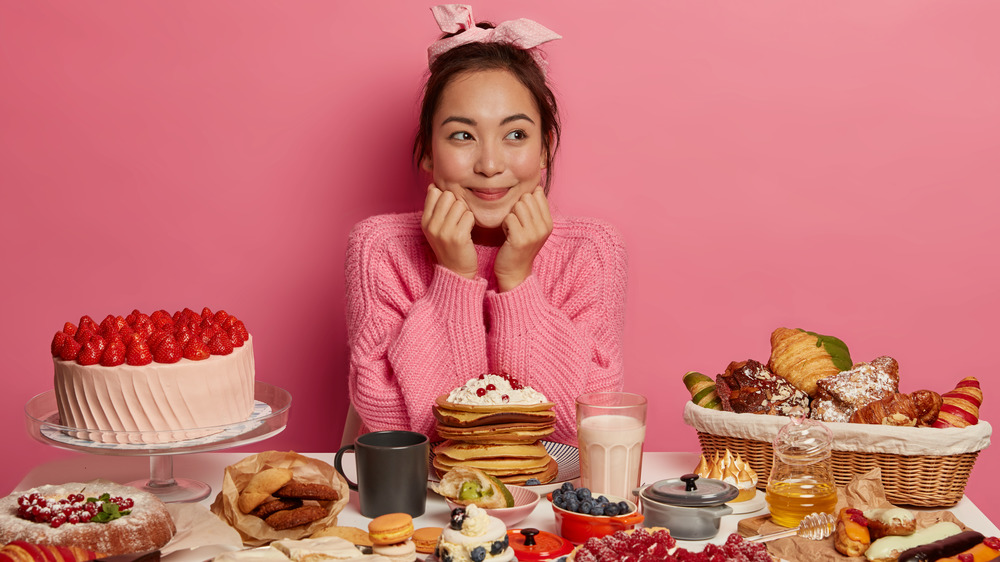 woman with dessert spread