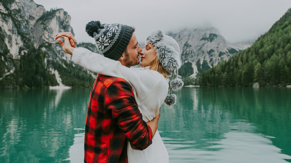 couple kissing in the wilderness