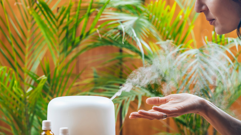 Woman with humidifier