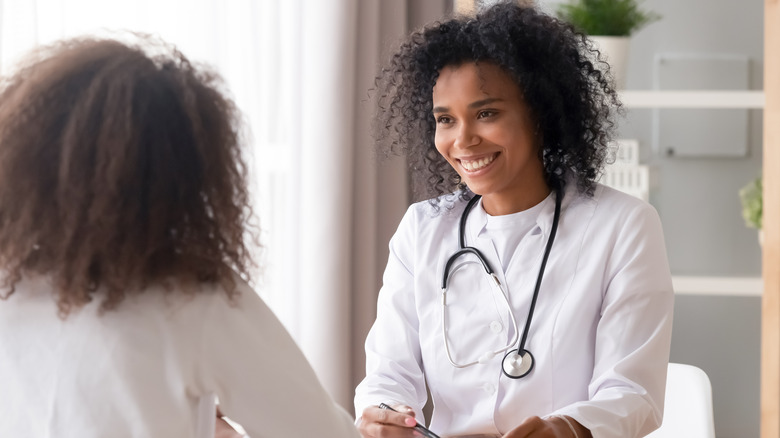 doctor speaking with patient