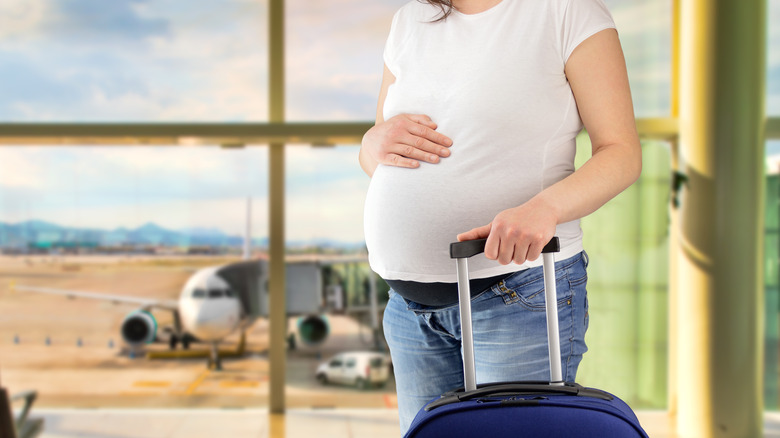 pregnant woman in airport