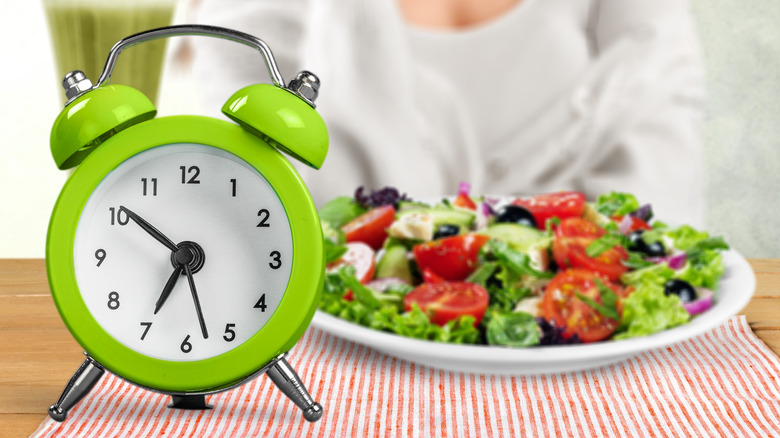 clock with food in background