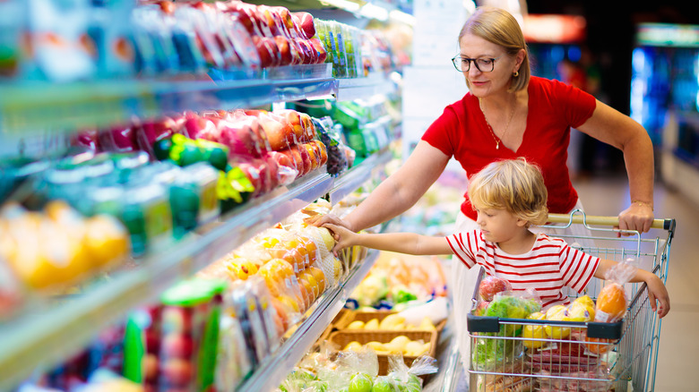 Mom and son picking out healthy food