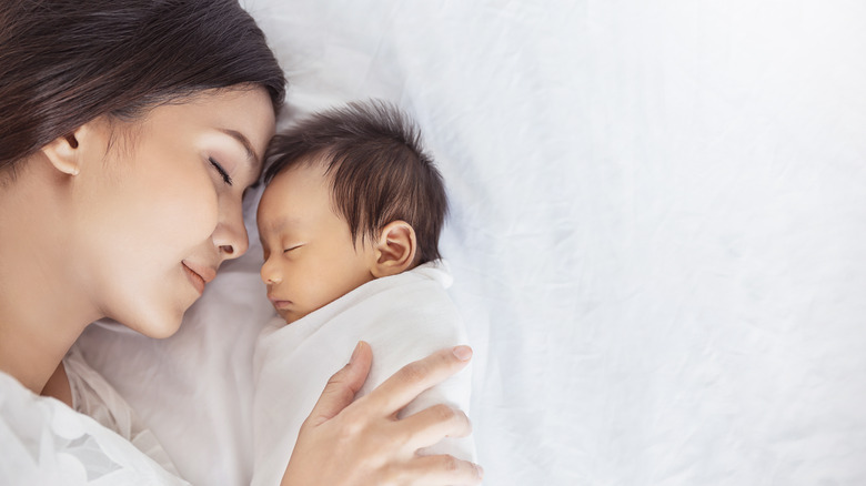 mom and baby sleeping