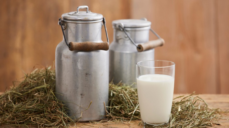 milk on table with urns