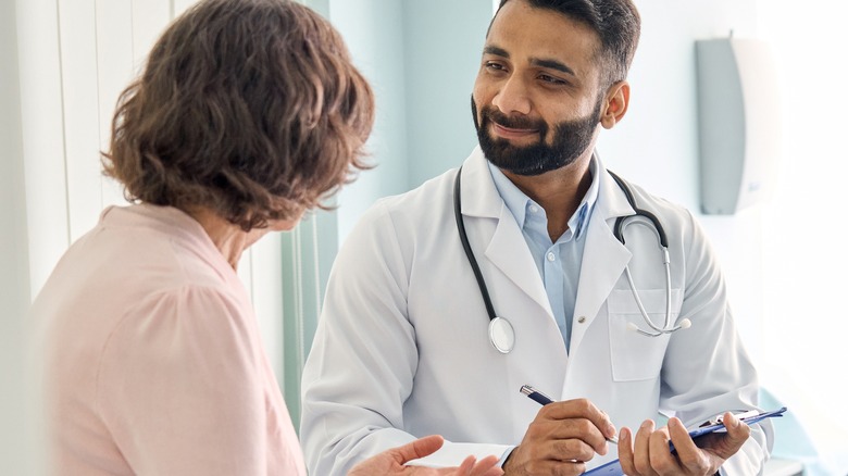 woman talking to doctor