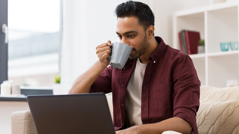 man drinking tea