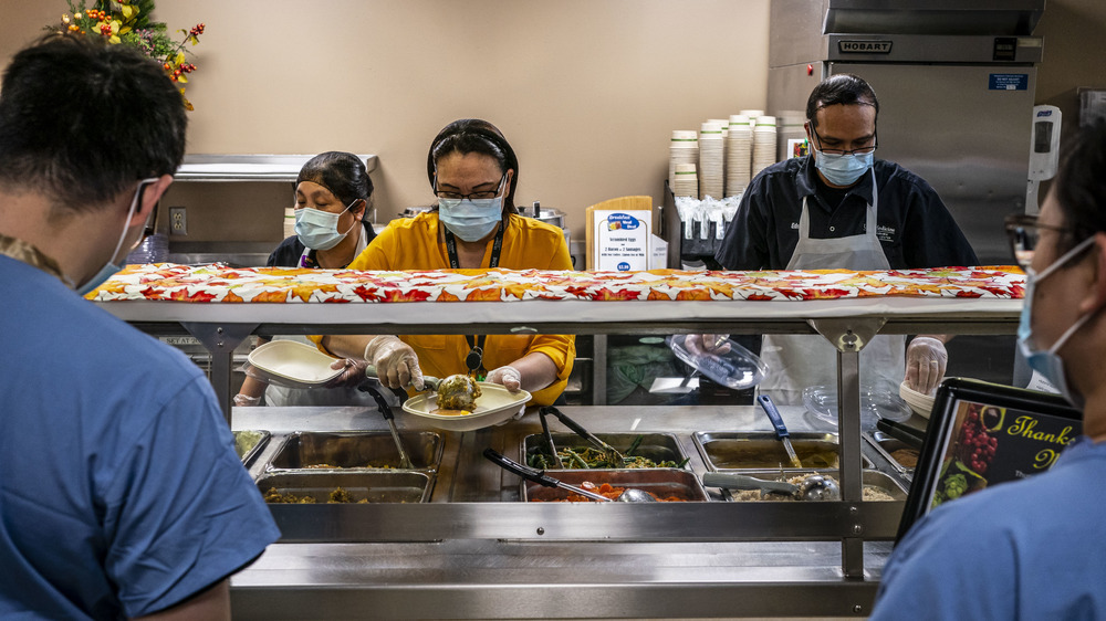 Medical workers visit a hospital cafeteria