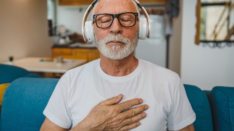 older man meditating