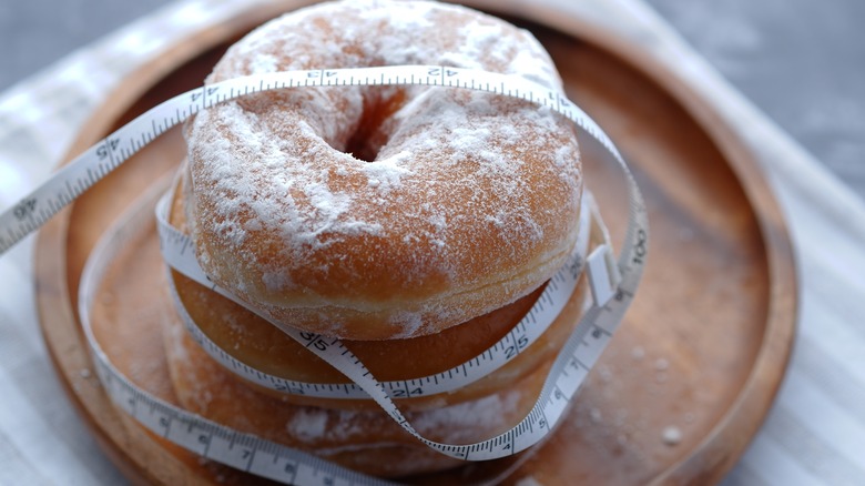 donut surrounded by measuring tape