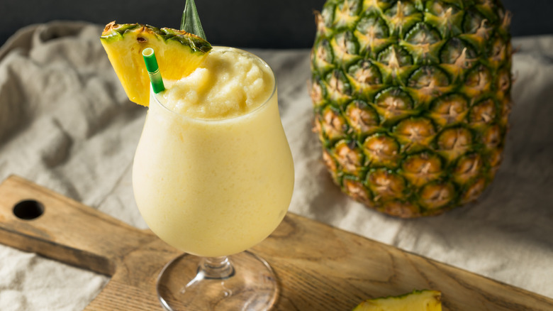 frozen pina colada with a pineapple