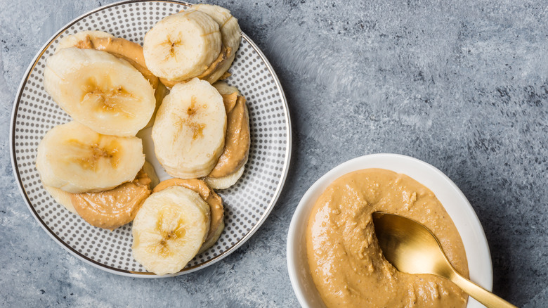 Plate of banana slices covered in cashew butter