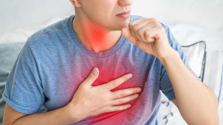 Person with inflamed chest and throat