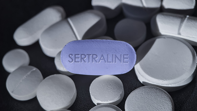 blue and white sertraline tablets