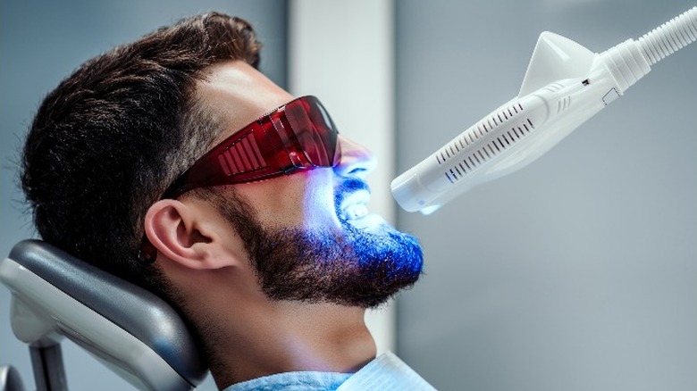 man dentist teeth whitening
