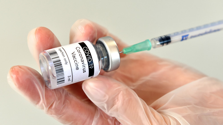 covid-19 vaccine in arm