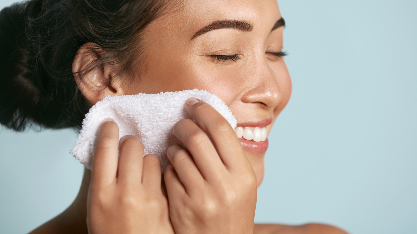 Why You Should Never Dry Your Face With a Hand Towel