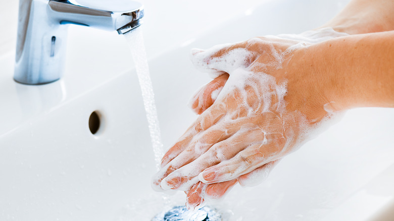 close up of hand washing