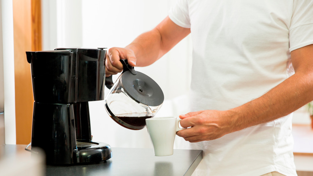 Man pouring coffee