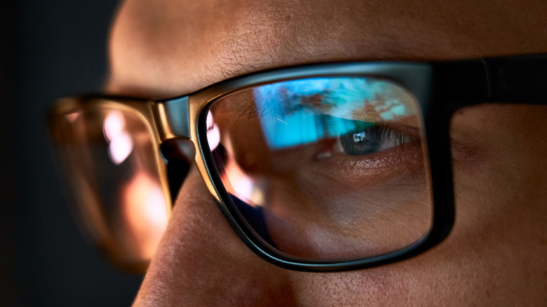 Close-up of man's glasses