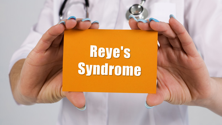 Doctor holding paper that says "Reye's Syndrome"