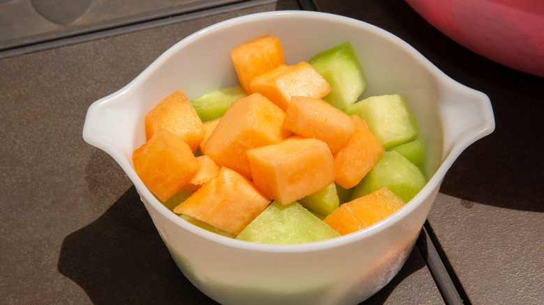 Diced cantaloupe pieces in a bowl.