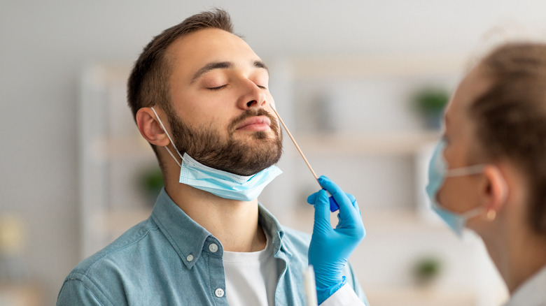 Doctor performing a Covid test