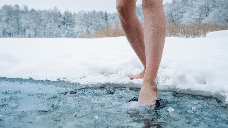 legs walking into ice water 