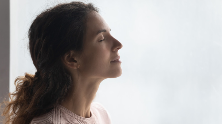 woman practicing peaceful mindfulness