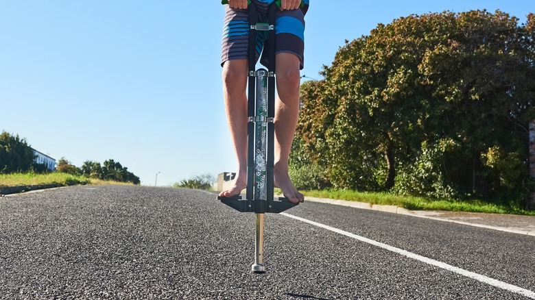 Young boy on a pogo stick