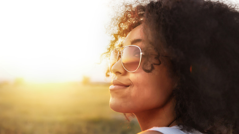 Woman getting vitamin D 