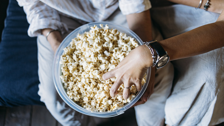 Eating popcorn as a snack